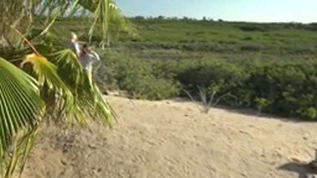 SAN CARLOS BCS MEXICO-2022: Woman and Child Walking on Sandy Dunes