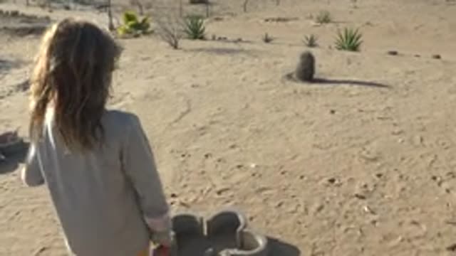 SAN CARLOS BCS MEXICO-2022: Girl Throwing and Walking in Sandy Desert