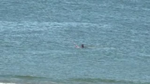 SAN JUANICO BCS MEXICO-2022: Kite Surfer Gliding on Ocean Surface