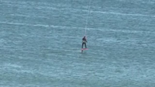 SAN JUANICO BCS MEXICO-2022: Kite Surfer Gliding on Calm Water