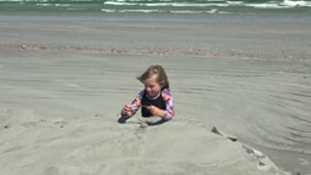 LA BOCANA BCS MEXICO-2022: Child Playing in Sand on a Beach