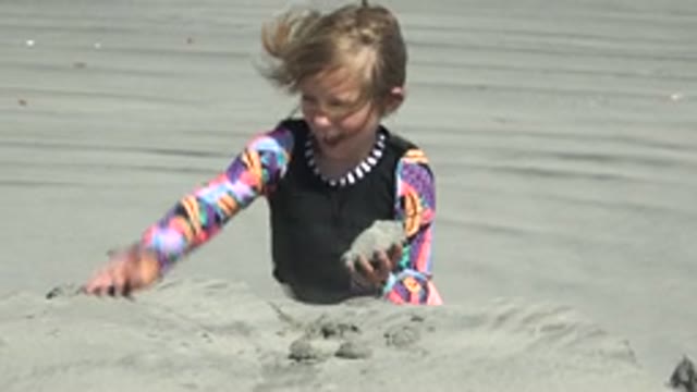 LA BOCANA BCS MEXICO-2022: Little Girl Shaping Sand on the Beach