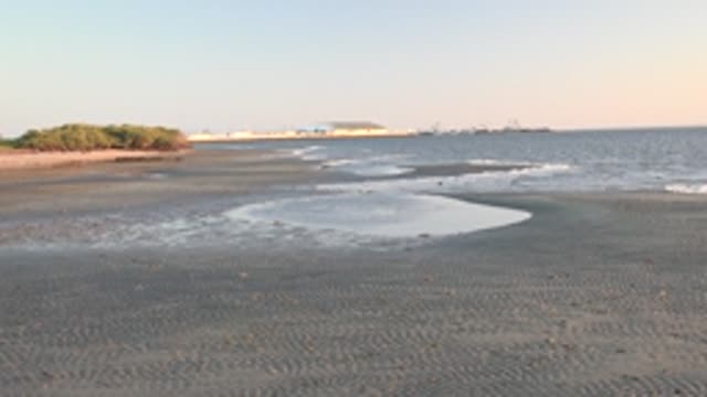 SAN CARLOS BCS MEXICO-2022: Gentle Waves Lapping on Dark Sandy Shore