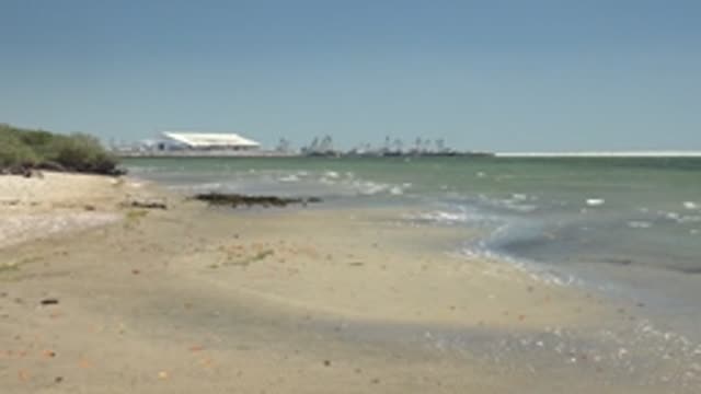 SAN CARLOS BCS MEXICO-2022: Gentle Waves Lapping Sandy Beach Shore
