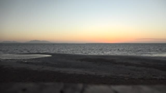 SAN CARLOS BCS MEXICO-2022: Beach at Dusk with Gentle Ocean Waves