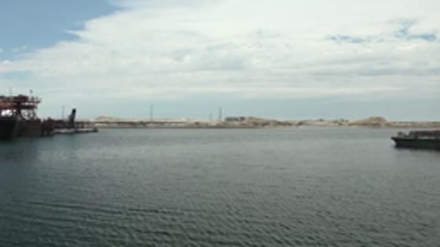 GUERRERO NEGRO BCS MEXICO-2022: Harbor Dock Crane Moving Into View