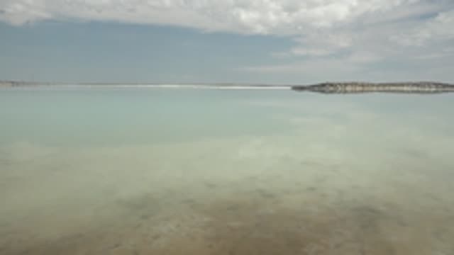 GUERRERO NEGRO BCS MEXICO-2022: Calm Salt Lake with Panning Shoreline View