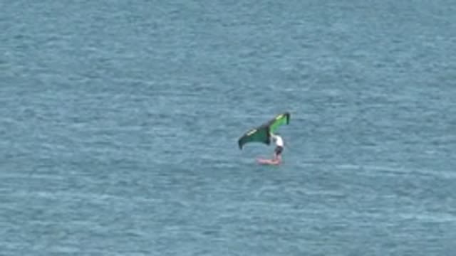 SAN JUANICO BCS MEXICO-2022: Kite Surfer Gliding on Calm Ocean Waters