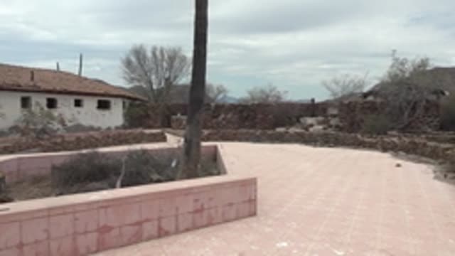 MULEGE BCS MEXICO-2022: Panning View of White Building with Red Tile Roof