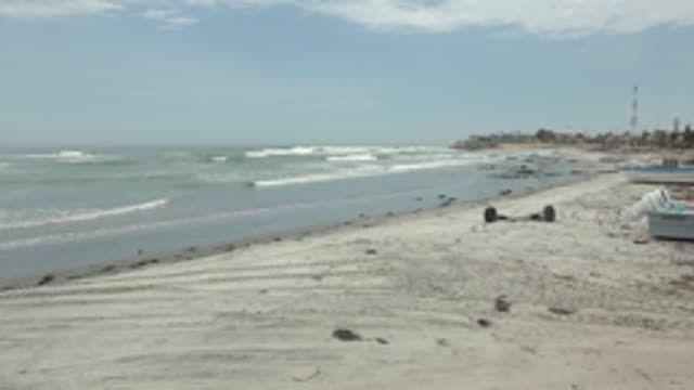 PUENTA ABREOJOS BCS MEXICO-2022: Beach with Rolling Ocean Waves and Shore Boats