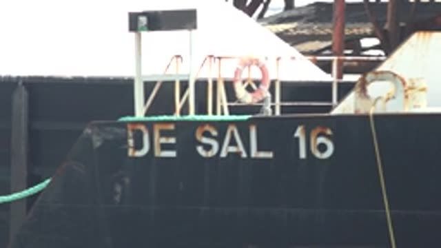 GUERRERO NEGRO BCS MEXICO-2022: Barge DE SAL 16 with Industrial Structure Background