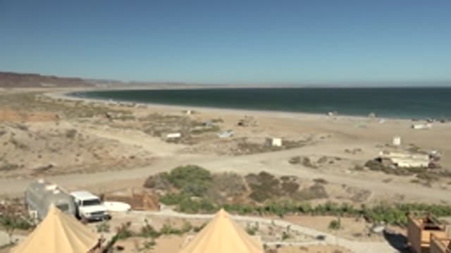 SAN JUANICO BCS MEXICO-2022: Desert Beach with Tents and Coastal Structures