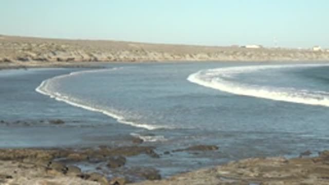 LA BOCANA BCS MEXICO-2022: Gentle Ocean Waves on Rocky Shoreline