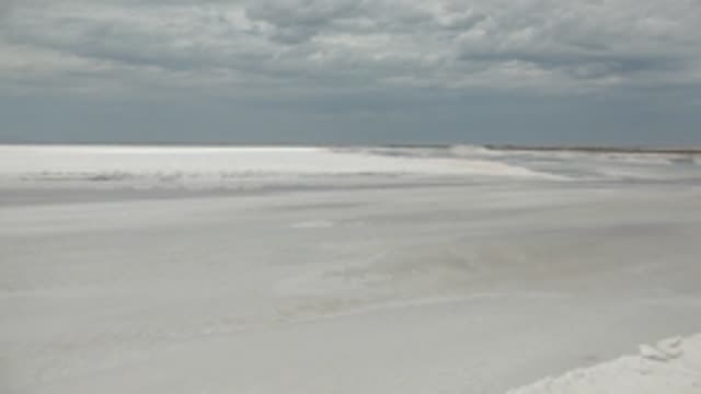 GUERRERO NEGRO BCS MEXICO-2022: Shifting Snow on a Frozen Water Surface