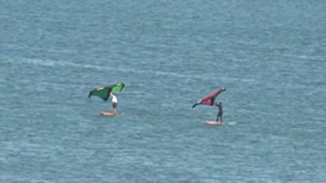 SAN JUANICO BCS MEXICO-2022: Kite Surfers Navigating Calm Ocean Waters