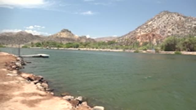 MULEGE BCS MEXICO-2022: Panning View of Lake Shore and Distant Mountains