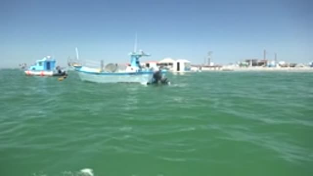 LA BOCANA BCS MEXICO-2022: Fishing Boats Drifting in a Coastal Harbor