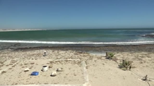 LA BOCANA BCS MEXICO-2022: Beach Shoreline and Ocean Waves Panning Right