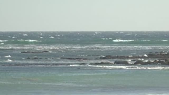 LA BOCANA BCS MEXICO-2022: Ocean Waves Crashing Against Rocky Shoreline
