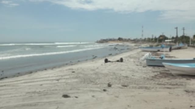 PUENTA ABREOJOS BCS MEXICO-2022: Beach with Boats, Waves, and Passing Figures