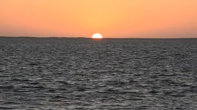 SAN CARLOS BCS MEXICO-2022: Sunset Over Calm Ocean Waves