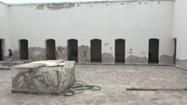 MULEGE BCS MEXICO-2022: Panning View of Courtyard with Arched Wall Openings