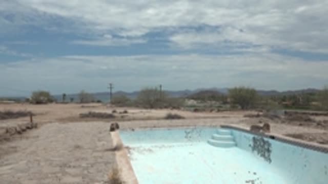 MULEGE BCS MEXICO-2022: Abandoned Pool in Arid Desert Landscape