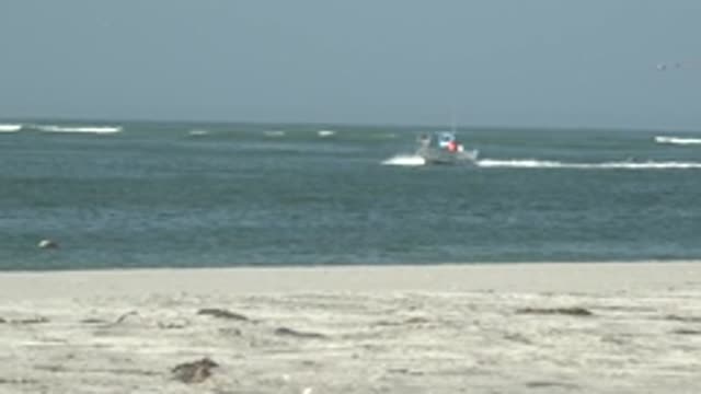 LA BOCANA BCS MEXICO-2022: Boat Approaching Shore on Sandy Beach