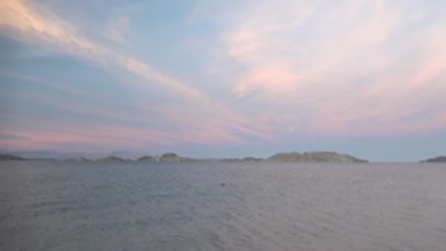 BAHIA DE LOS ANGELES BCS MEXICO-2022: Calm Sea Transitioning to Sandy Shore at Sunset