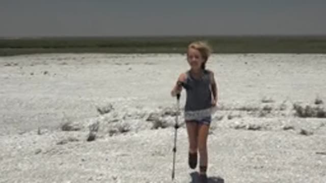 SAN CARLOS BCS MEXICO-2022: Girl and Woman Walking in a White Desert Plain