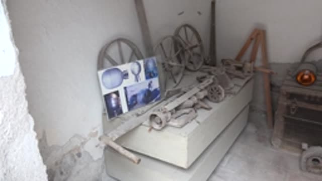 MULEGE BCS MEXICO-2022: Panning View of Vintage Tools and Posters in a Room