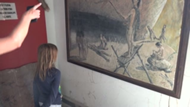 MULEGE BCS MEXICO-2022: Girl Observing a Historical Painting in a Room