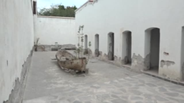 MULEGE BCS MEXICO-2022: Shuttered Window Opening and Closing in Courtyard