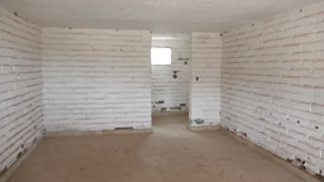 MULEGE BCS MEXICO-2022: Cleaning White Brick Walls in Empty Room
