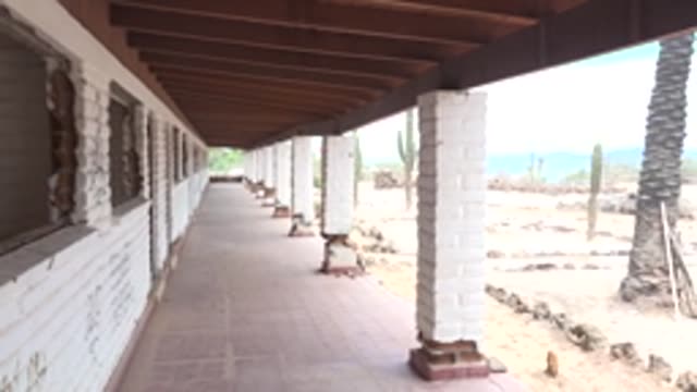 MULEGE BCS MEXICO-2022: Covered Walkway with White Brick Columns in Desert