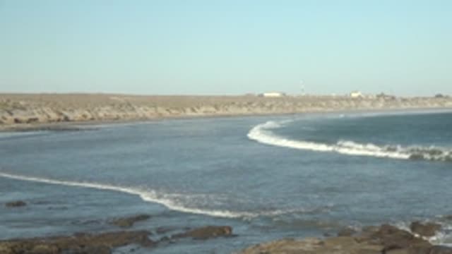 LA BOCANA BCS MEXICO-2022: Waves Rolling In on a Rocky Shoreline