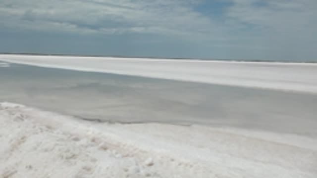 GUERRERO NEGRO BCS MEXICO-2022: Snowy Shore of a Frozen Lake
