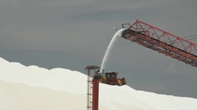 GUERRERO NEGRO BCS MEXICO-2022: Conveyor System Depositing White Material Into Pile