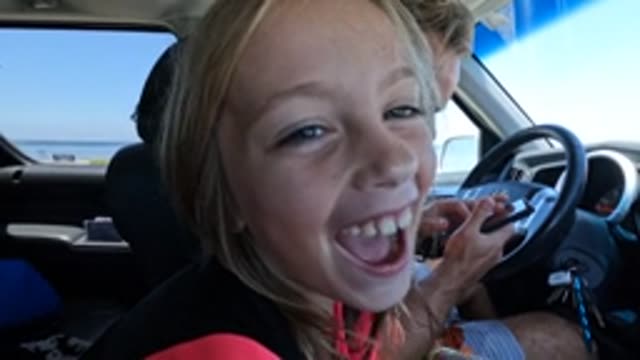 BAJA CALIFORNIA MEXICO-2022: Child in Car Making Playful Expressions and Gestures