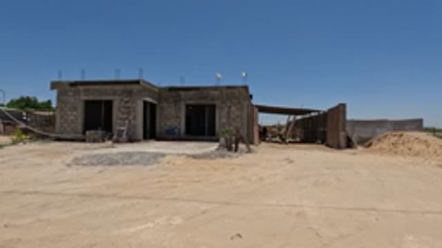 BAJA CALIFORNIA MEXICO-2022: Pan Across Construction Site and Rural Surroundings