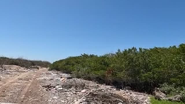 BAJA CALIFORNIA MEXICO-2022: Dirt Road Littered with Trash and Debris