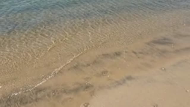 BAJA CALIFORNIA MEXICO-2022: Gentle Waves Lapping on Sandy Shore