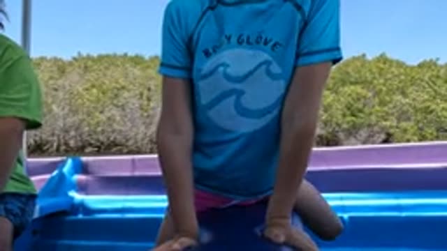 BAJA CALIFORNIA MEXICO-2022: Child Shifting Positions on a Boat