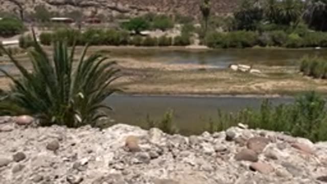 BAJA CALIFORNIA MEXICO-2022: Riverside Pan in Arid Rocky Terrain