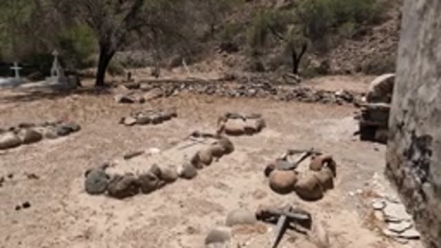 BAJA CALIFORNIA MEXICO-2022: Rural Cemetery with Stone Tombs and Crosses