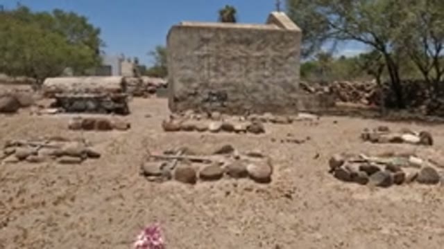 BAJA CALIFORNIA MEXICO-2022: Child Walking Among Desert Graves
