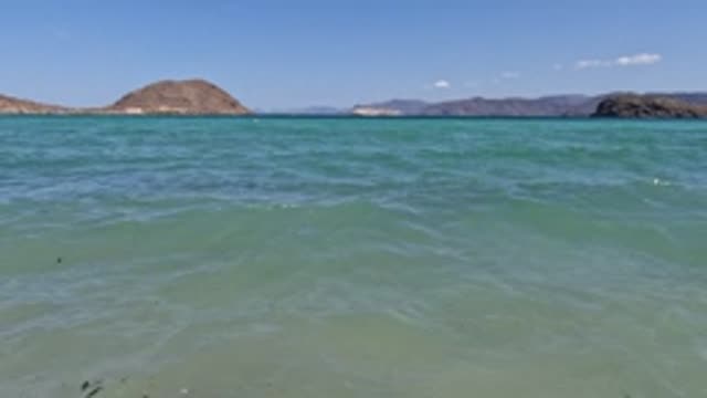 BAJA CALIFORNIA MEXICO-2022: Gentle Waves Lapping at a Sandy Shore