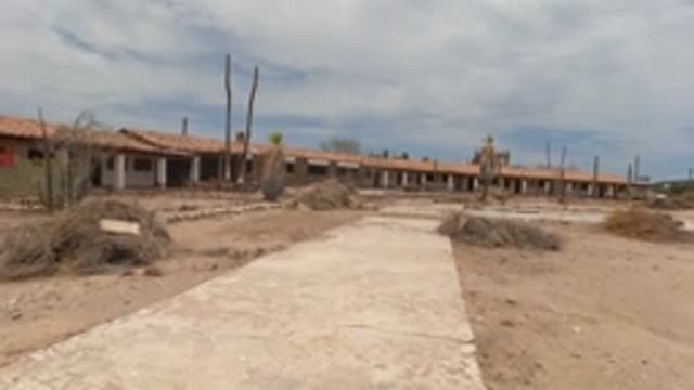 BAJA CALIFORNIA MEXICO-2022: Desert Abandoned Building with Concrete Path