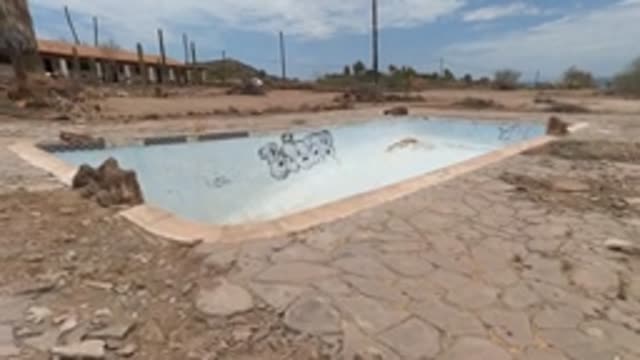 BAJA CALIFORNIA MEXICO-2022: Abandoned Dry Swimming Pool in Arid Landscape