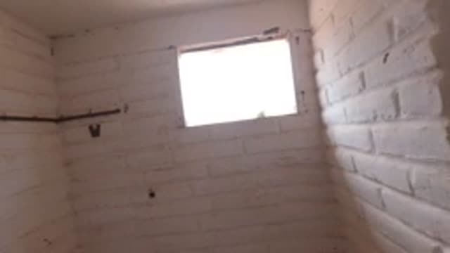 BAJA CALIFORNIA MEXICO-2022: Bathroom Renovation Inspection with Person Moving Through Space